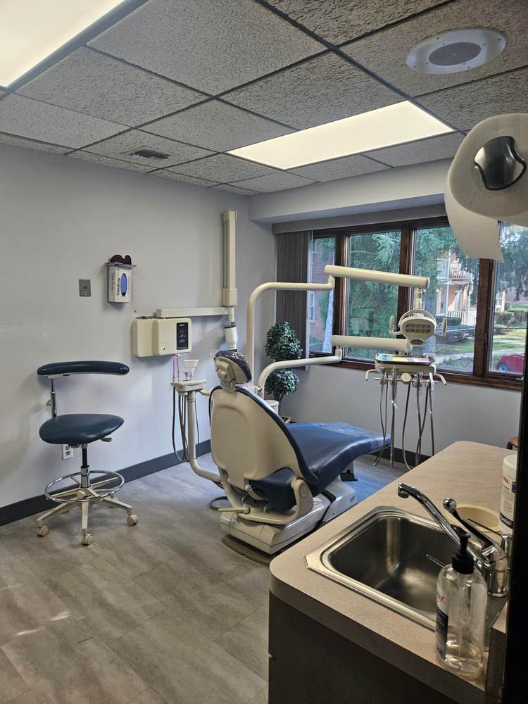 Treatment room with window at Carey Family Dentistry